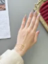 Gold Hand Chain Bracelet with Zircon Accent